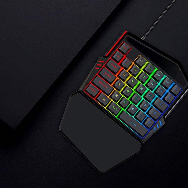 تي- وولف لوحة مفاتيح الألعاب السلكية بيد واحدة T-WOLF T17، 35 مفتاحًا، إضاءة خلفية RGB ملونة، تصميم مريح، لوحة مفاتيح لأجهزة أندرويد/ويندوز/آي أو إس - Image 3