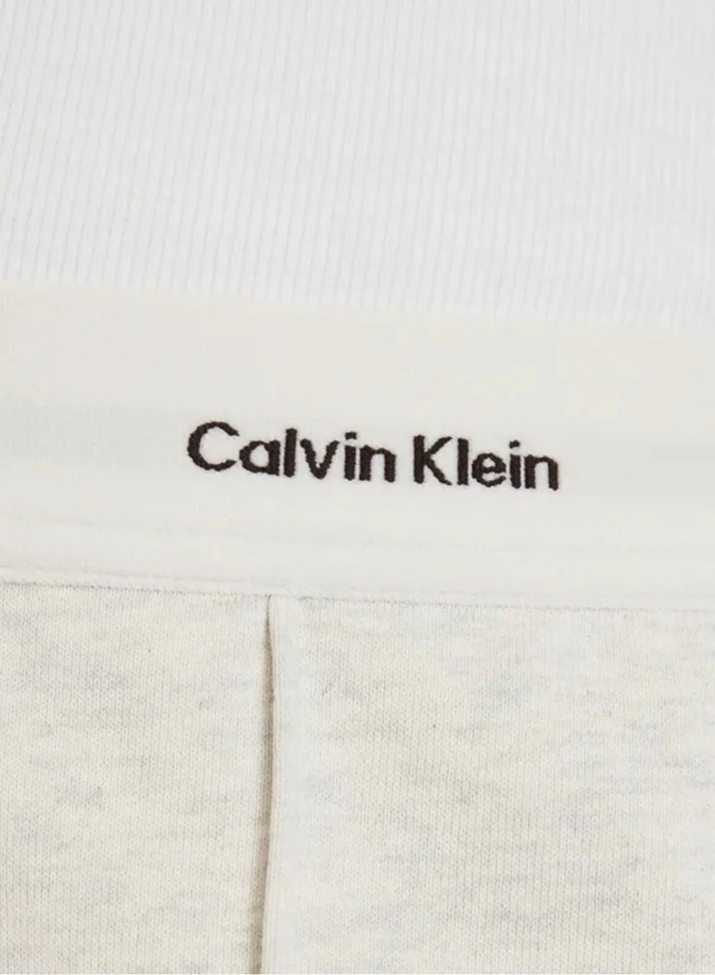 Calvin Klein Jeans Vanilla Heather Logo Waistband Pressed Crease Terry Joggers for Women | Best Price UAE
