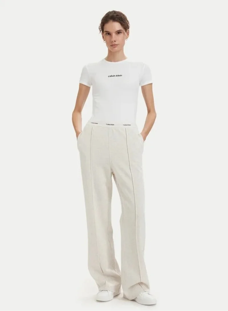 Calvin Klein Jeans Vanilla Heather Logo Waistband Pressed Crease Terry Joggers for Women | Best Price UAE