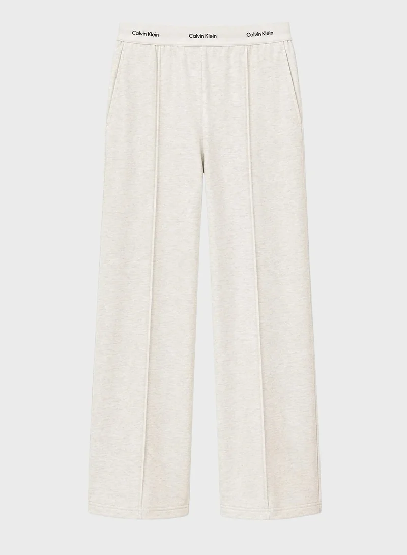 Calvin Klein Jeans Vanilla Heather Logo Waistband Pressed Crease Terry Joggers for Women | Best Price UAE