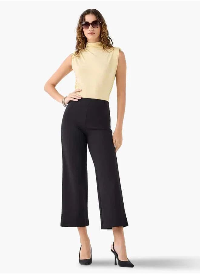 ايكونيك Iconic Relaxed Fit Sleeveless Top with Turtle Neck