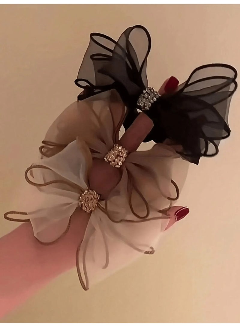 ربطات شعر مجموعه من 3 قطع من ربطات شعر  مطاطيه ناعمه بالوان متنوعه مزينه بكريستالات لامعة بتصميم فيونكه لطيفه ربطات شعرتضيف لمسه مميزه لتسريحتك - Image 1