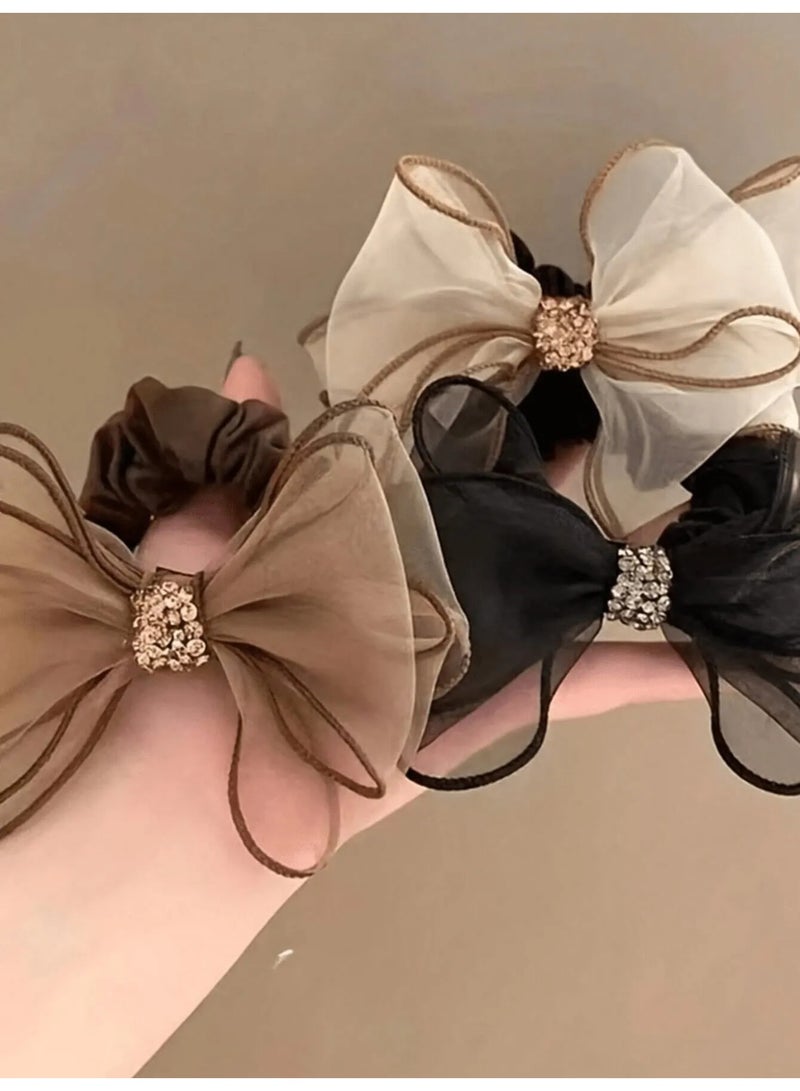 ربطات شعر مجموعه من 3 قطع من ربطات شعر  مطاطيه ناعمه بالوان متنوعه مزينه بكريستالات لامعة بتصميم فيونكه لطيفه ربطات شعرتضيف لمسه مميزه لتسريحتك - Image 2