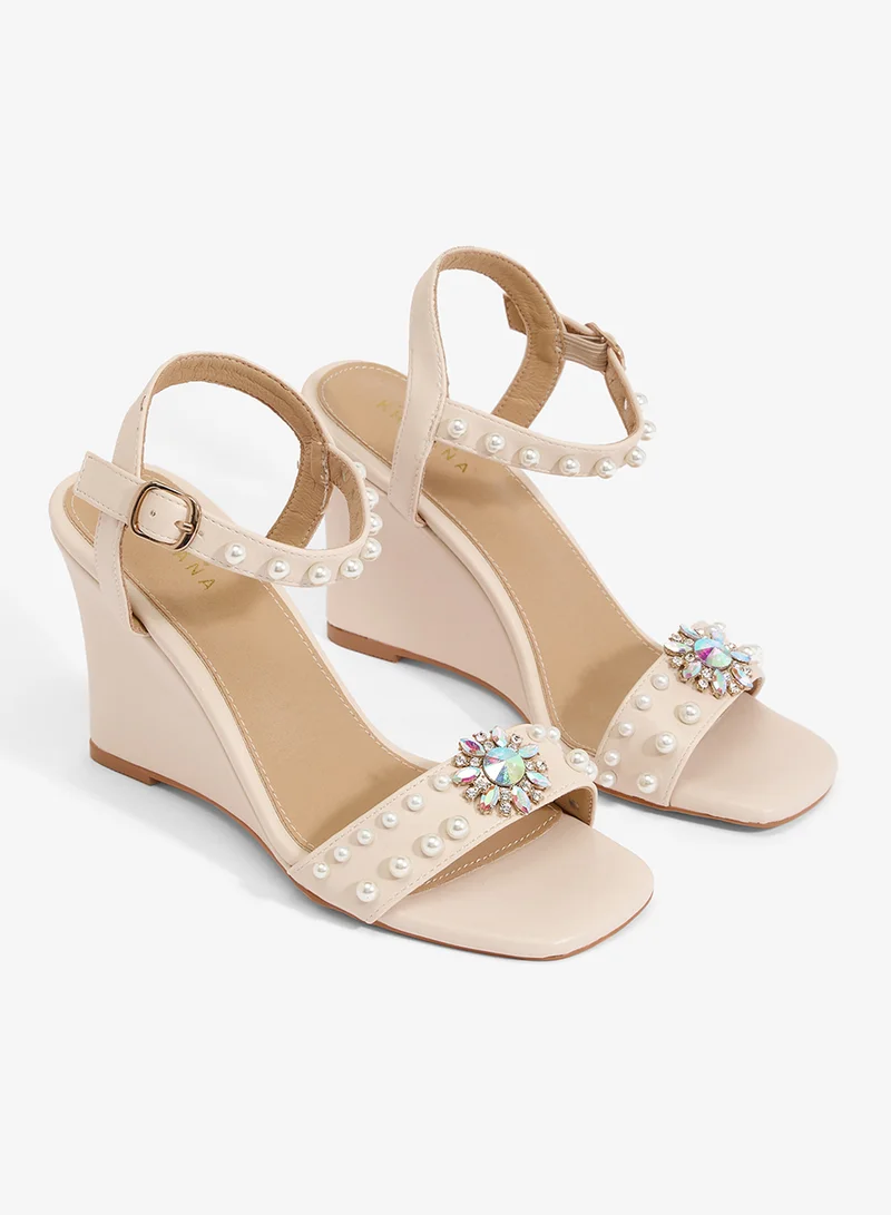 Khizana Cream Ivory wedge sandal with pearl straps and crystal brooch for Women | Best Price UAE