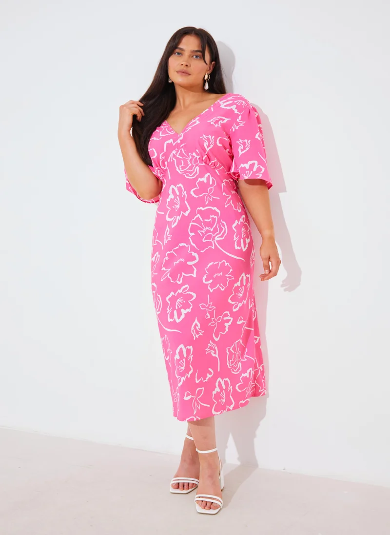 In the style Floral Print Flared Sleeve Dress