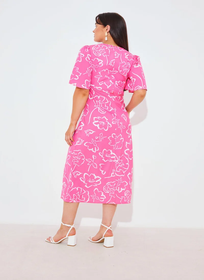 In the style Floral Print Flared Sleeve Dress