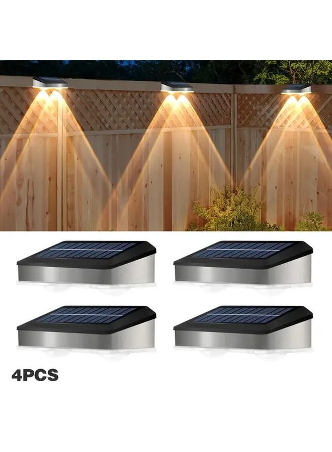4 عبوات من مصابيح الحائط الشمسية الخارجية باللون الأبيض الدافئ LED لحديقة السور الفناء - Image 1