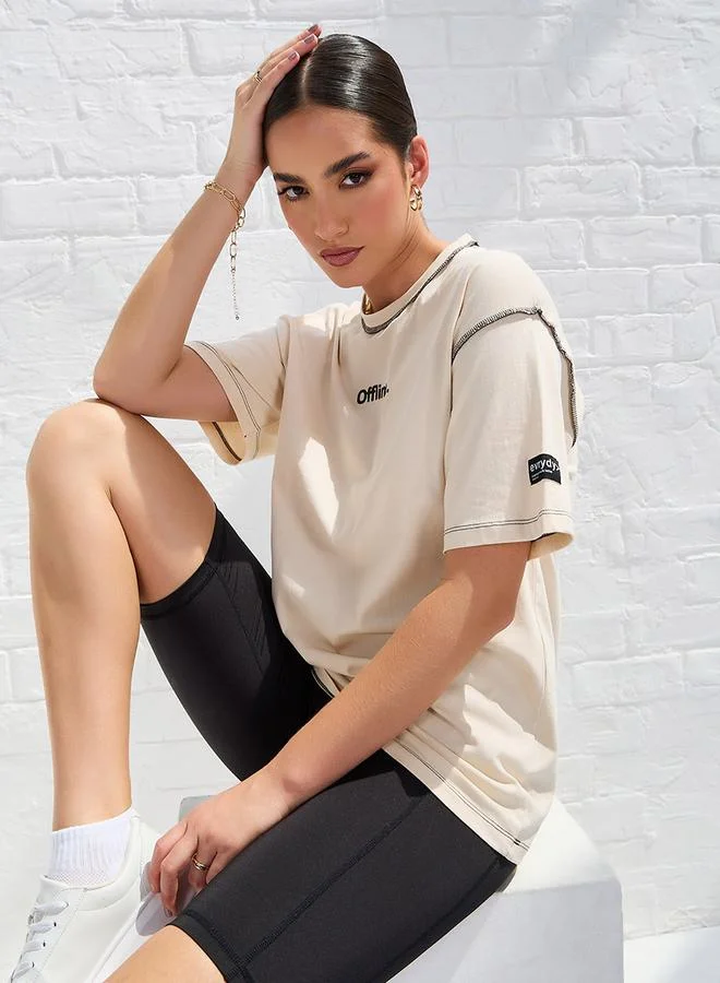 Styli Oversized Drop Shoulder Slogan T-Shirt with Exposed Seam