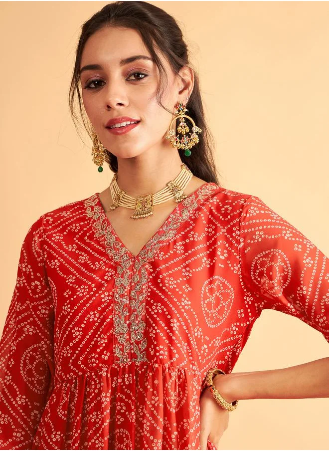 SASSAFRAS Embroidered Bandhej Wrap Peplum Top by Styli