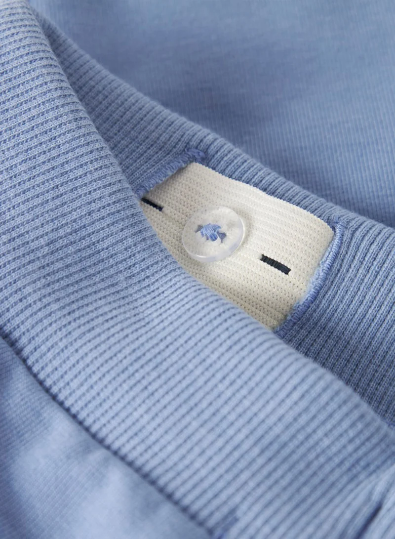 نيم ات سروال رياضي للأطفال بطبعة ورباط شداد