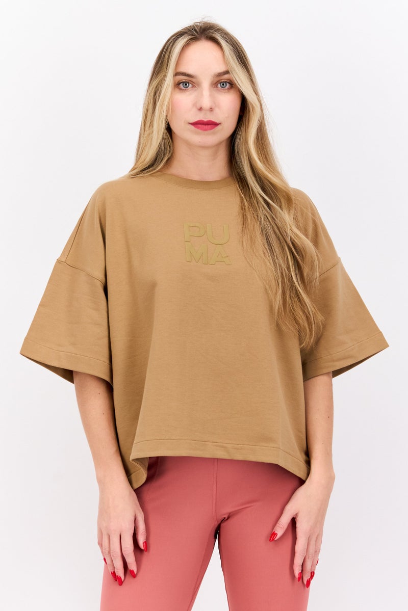 PUMA Women Sportswear Fit Short Sleeve Outdoor Top, Tan  - Image 1