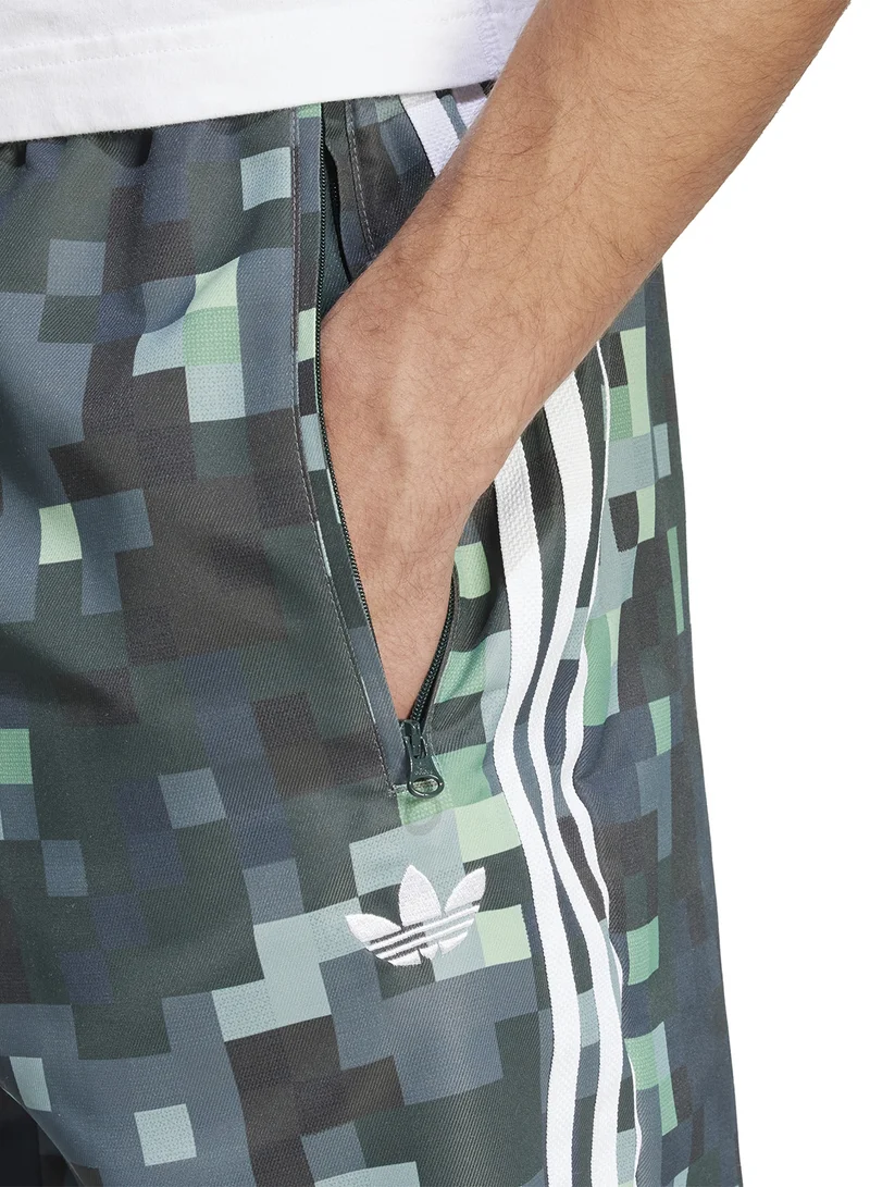adidas بنطلون رياضي بشعار