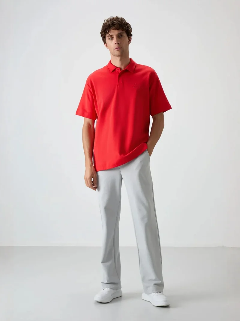 تومي لايف TOMMY Men's Oversized Polo T-Shirt