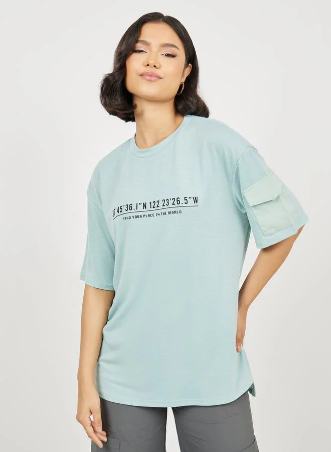 Styli Pocket Detail Sleeves Find Your Place In The World Slogan Print T-shirt