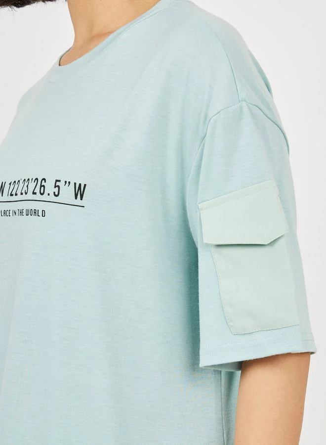 Styli Pocket Detail Sleeves Find Your Place In The World Slogan Print T-shirt