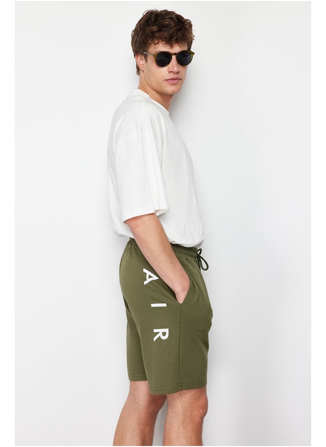 trendyol - Khaki Regular/Normal Fit Medium Length Text Printed Shorts TMNSS21SR0377 - Image 1