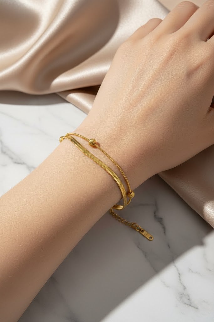 FLUFFY Women’s Bracelet, Elegant Layered Design, Flat Chain with Balls - Image 1