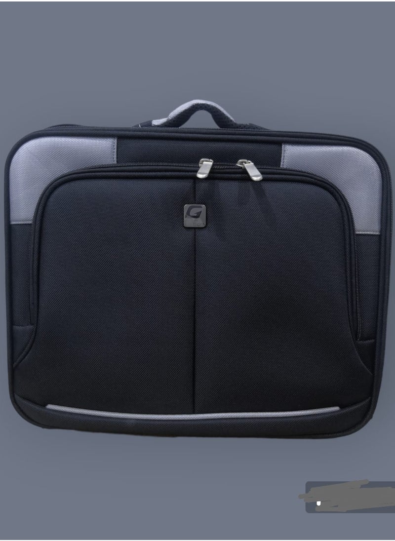 Gcom - laptop bag designed with corners to enhance the protection of your device and divided from the inside to meet your needs with an elegant and harmonious appearance in black and gray. - Image 1