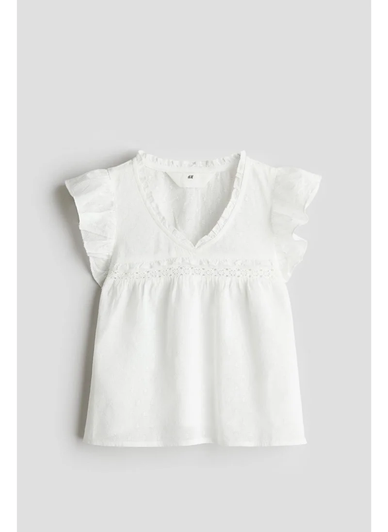 H&M Frill-trimmed cotton blouse