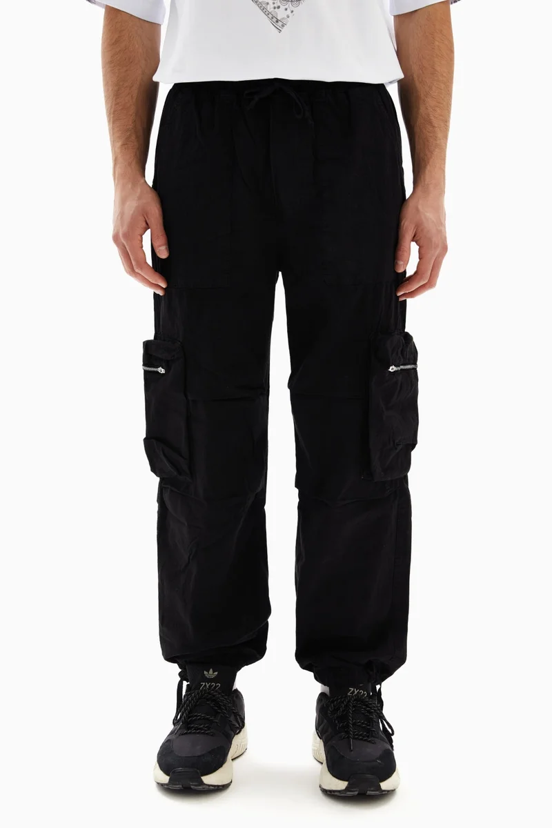 Wecre8 Black Plain Cargo Pants By WECRE8