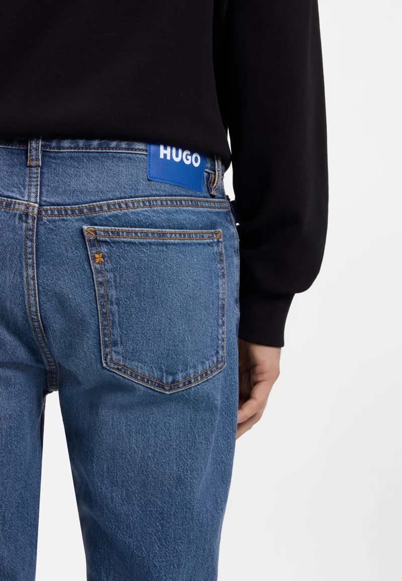 HUGO Dark Blue Slim-fit jeans in mid-blue stretch denim for Men | Best Price UAE