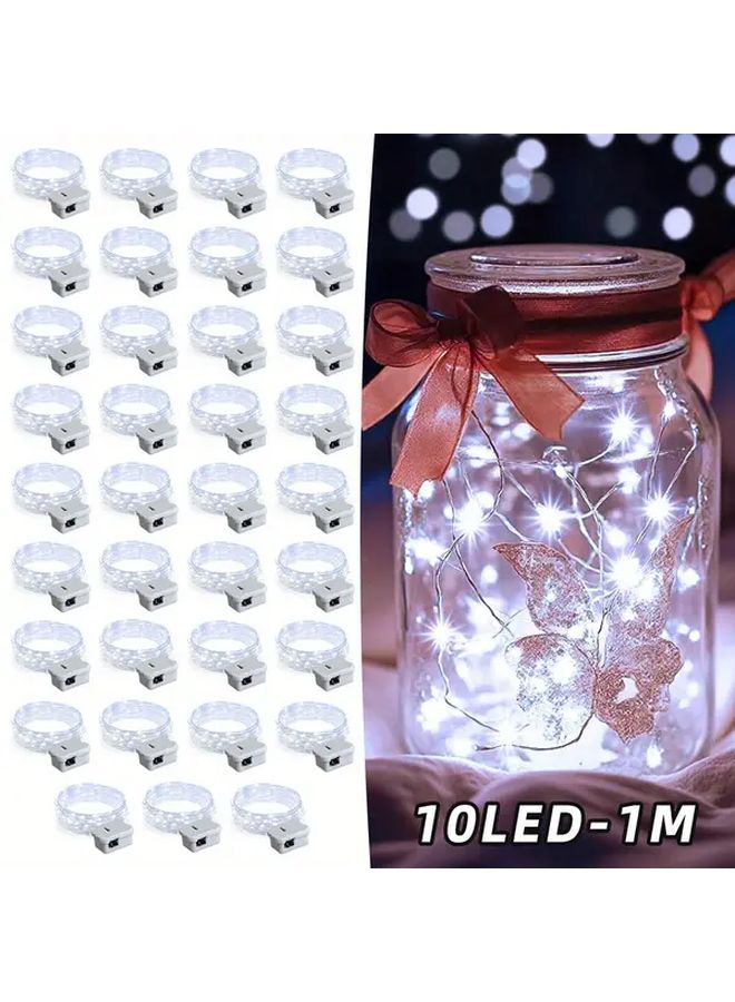 35 عبوة من أضواء الخيوط الجنية البيضاء بـ10 مصابيح LED، بطول 39.37 بوصة، تعمل بالبطارية وب3 أوضاع - Image 1