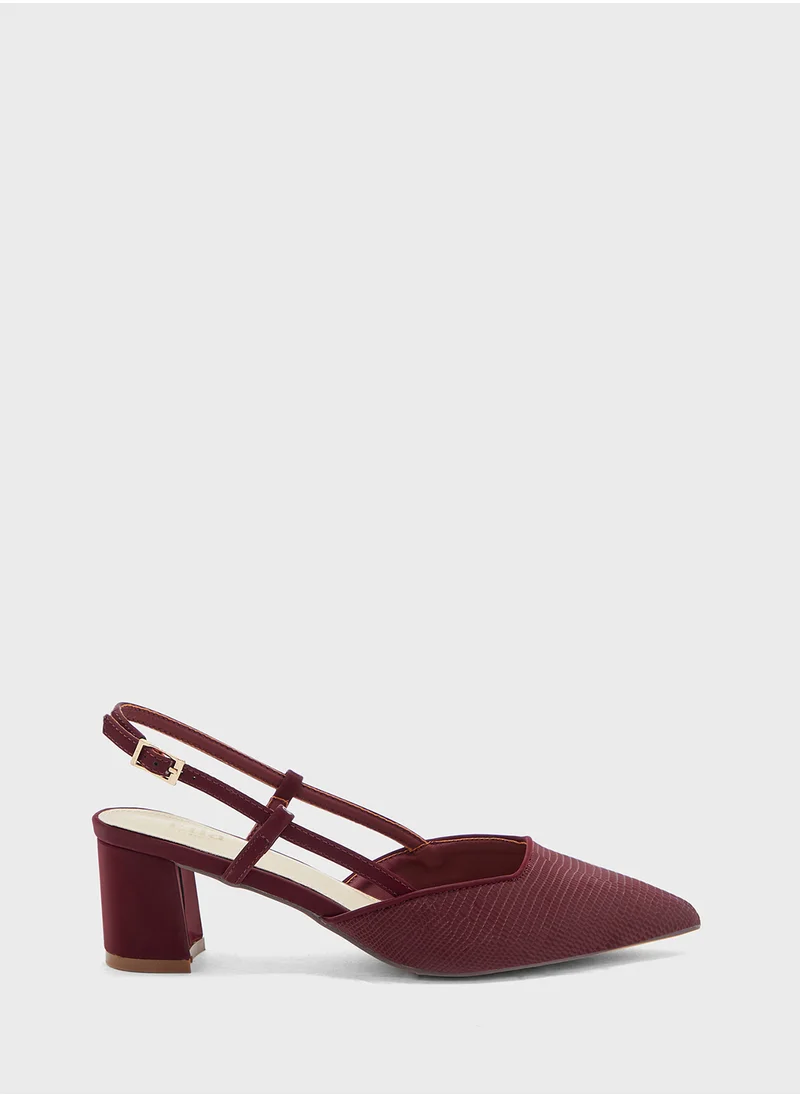 ايلا Textured Block Heel Back Strap Pump