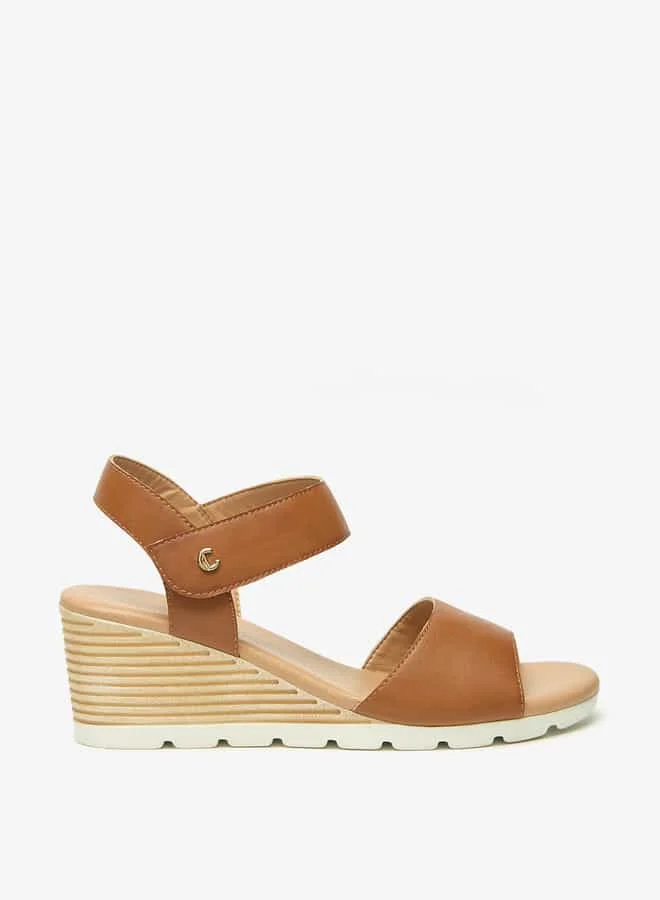 Le Confort Women Solid Wedge Heel Sandals with Hook and Loop Closure