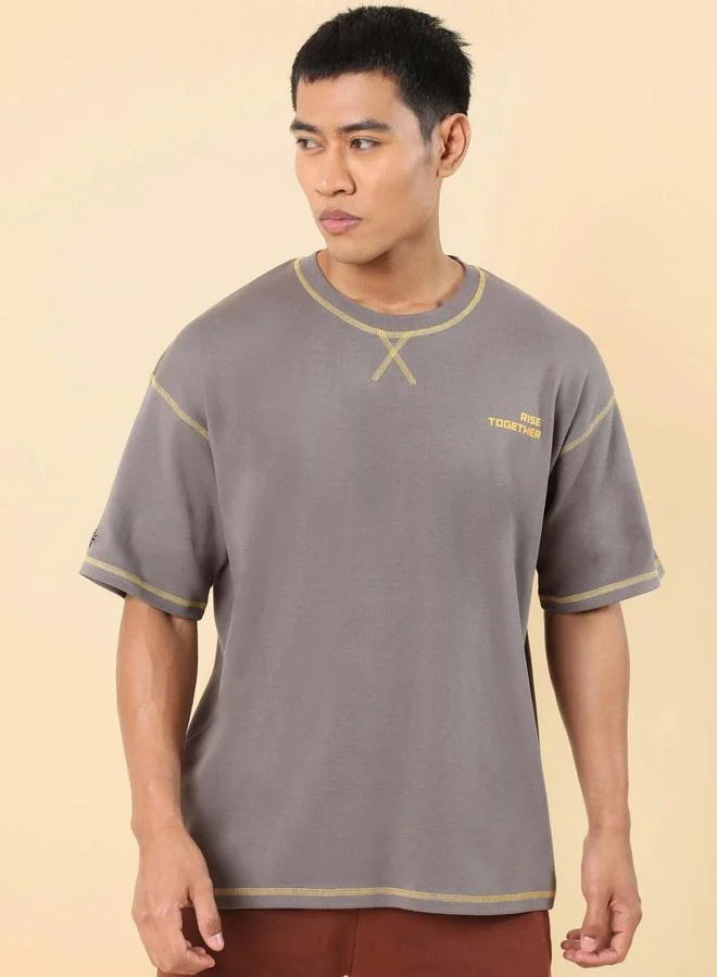 كالت تيشيرت فضفاض مطبع بكتابة