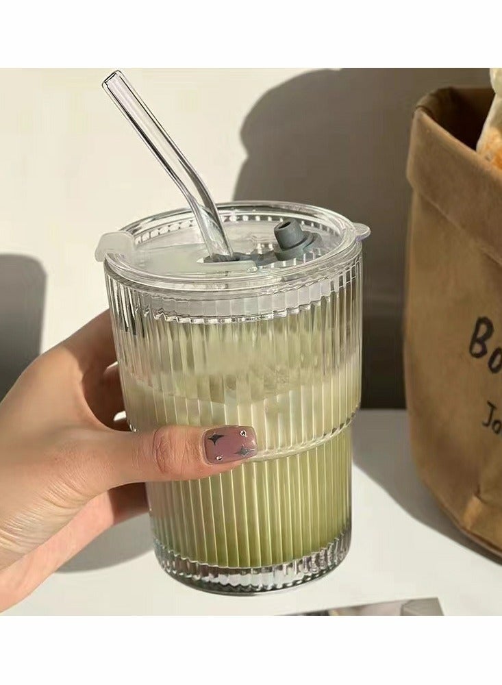 Generic One 400ml glass beverage cup, featuring a minimalist design. The transparent material allows for easy observation, and the stripes on the cup body increase friction to prevent slipping. It comes with a glass straw and a lid, which are environmentally friendly, hygienic, and help to keep the drink warm. The cup is very practical and aesthetically pleasing, with the advantage of being easy to clean. It is suitable for daily use in offices, homes, and during travel. - Image 1