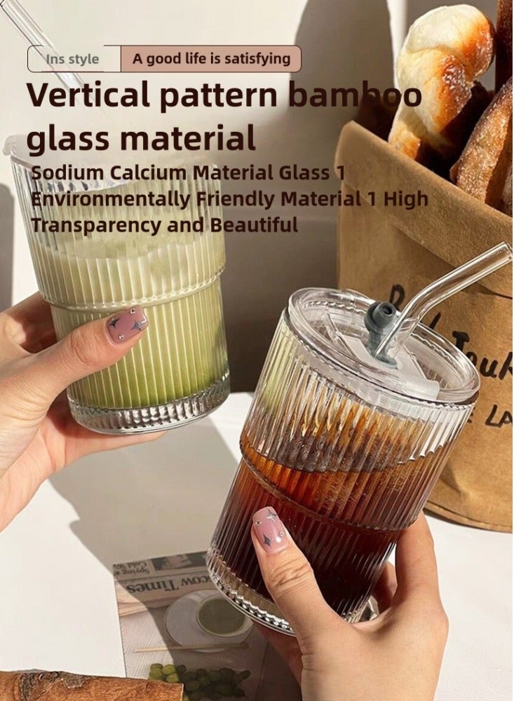 Generic One 400ml glass beverage cup, featuring a minimalist design. The transparent material allows for easy observation, and the stripes on the cup body increase friction to prevent slipping. It comes with a glass straw and a lid, which are environmentally friendly, hygienic, and help to keep the drink warm. The cup is very practical and aesthetically pleasing, with the advantage of being easy to clean. It is suitable for daily use in offices, homes, and during travel. - Image 3