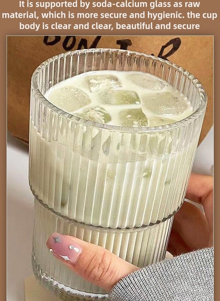 Generic One 400ml glass beverage cup, featuring a minimalist design. The transparent material allows for easy observation, and the stripes on the cup body increase friction to prevent slipping. It comes with a glass straw and a lid, which are environmentally friendly, hygienic, and help to keep the drink warm. The cup is very practical and aesthetically pleasing, with the advantage of being easy to clean. It is suitable for daily use in offices, homes, and during travel. - Image 4