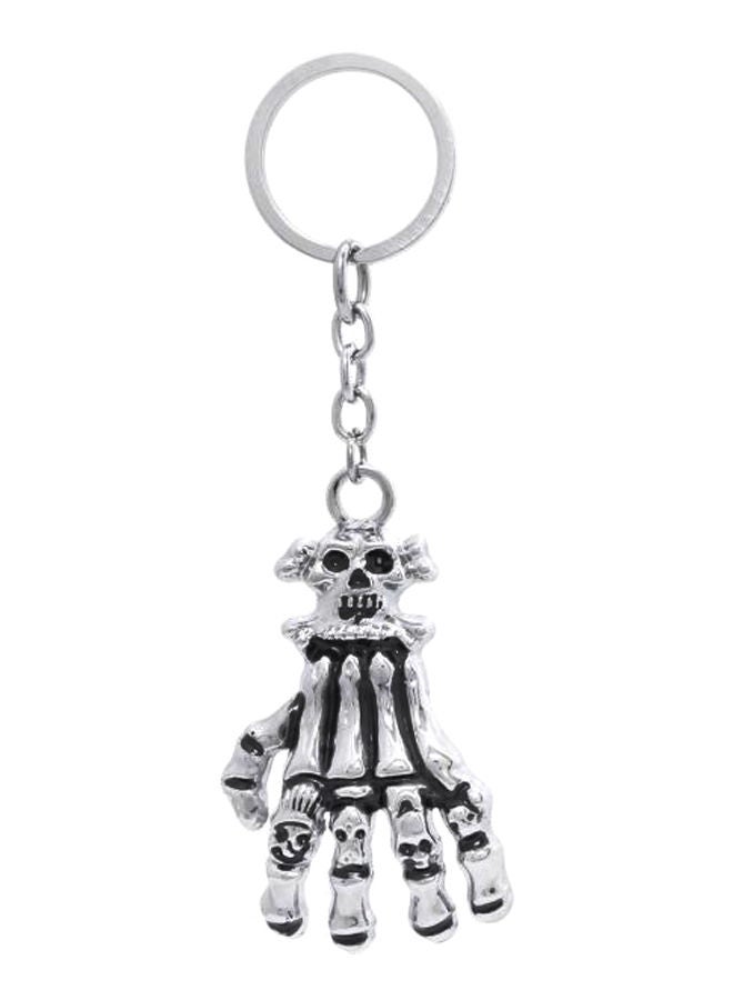 NIBEMINENT Zinc Antique Skull Hand Keychain - Image 1