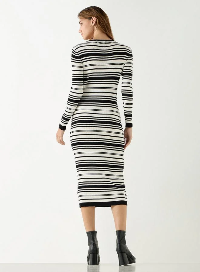 تواكستريمز فستان مقلم بقصّة ضيقة وأكمام طويلة من تو إكستريمز