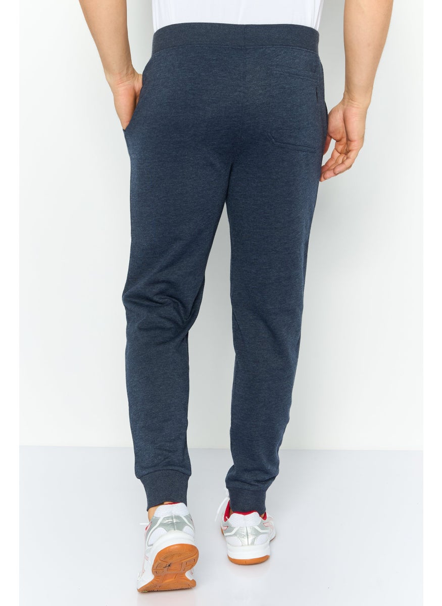 SKECHERS - Men Sportswear Fit Outdoor Jogger Pants, Navy - Image 1