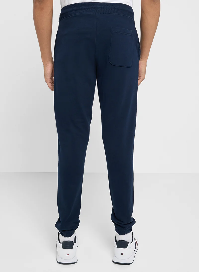 تومي جينز Signature Logo Cuffed Slim Joggers