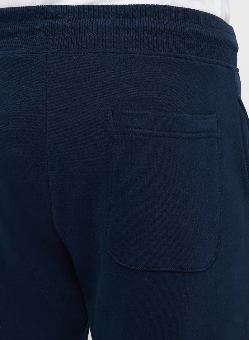 تومي جينز Signature Logo Cuffed Slim Joggers