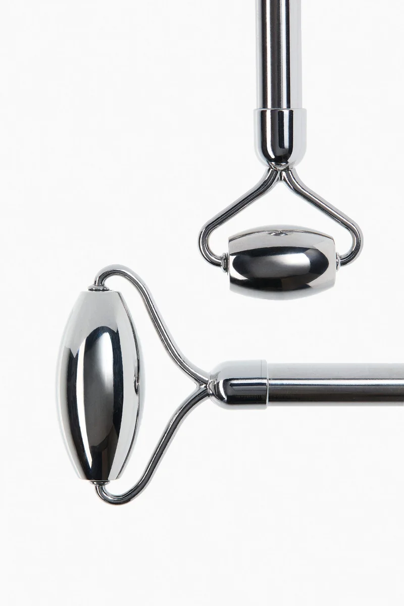 اتش اند ام أداة تدليك الوجه بتصميم دوّار