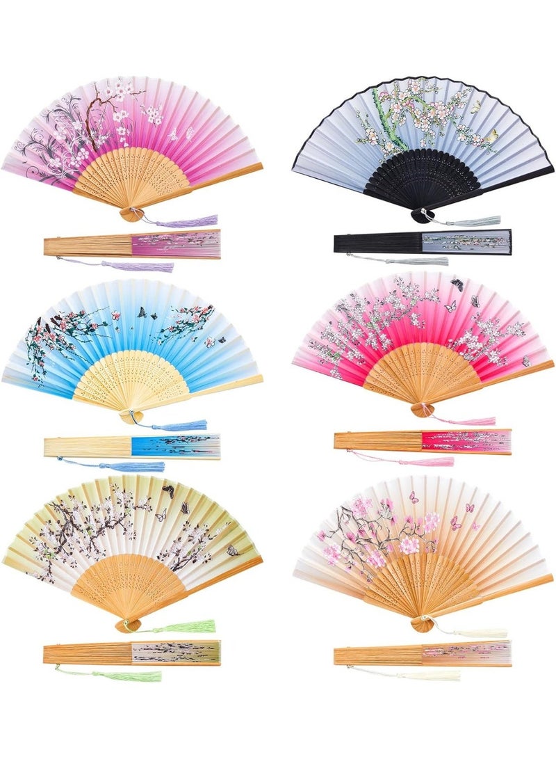 A collection of hand fans arranged in an attractive fan-like pattern against a light-colored wooden background that reflects simplicity and sophistication, featuring a variety of random colors. - Image 2