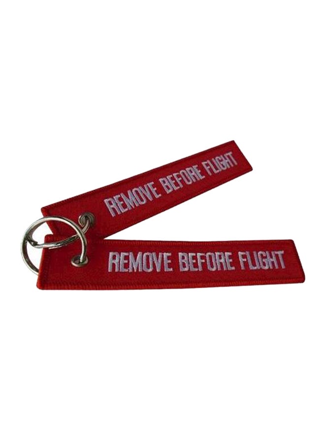 سلسلة مفاتيح مزودة بدلاية قماشية تحمل عبارة Remove Before Flight