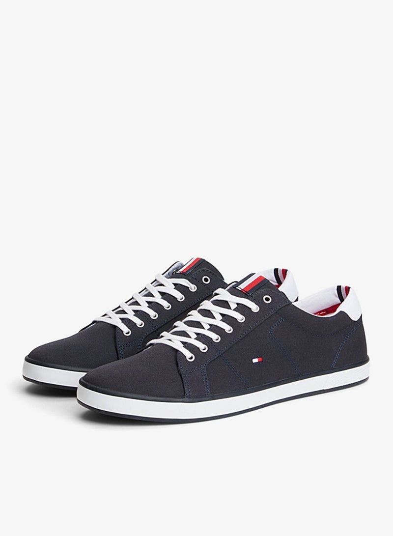 TOMMY HILFIGER canvas lace up low top sneakers - Image 1
