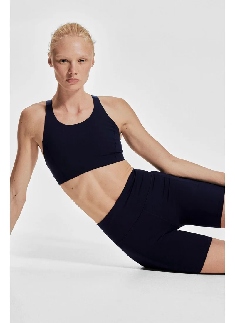 H&M Pocket-detail sports cycling shorts in DryMove™