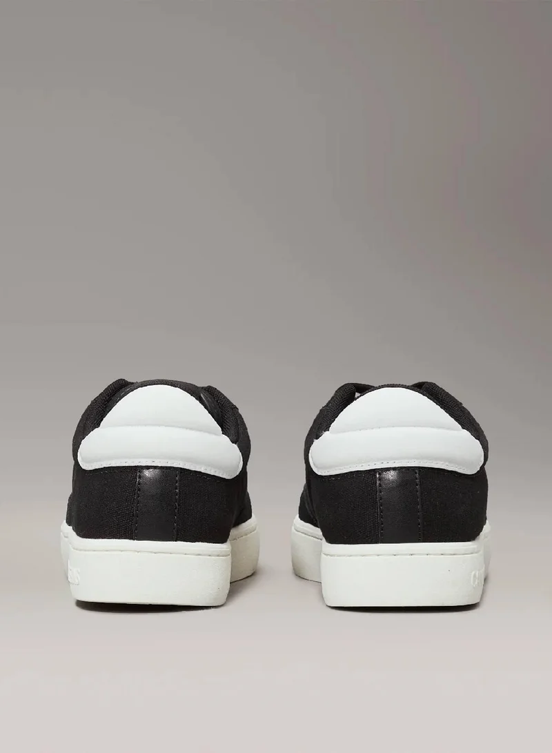 Calvin Klein Jeans Black/Bright White Canvas Trainers for Men | Best Price UAE