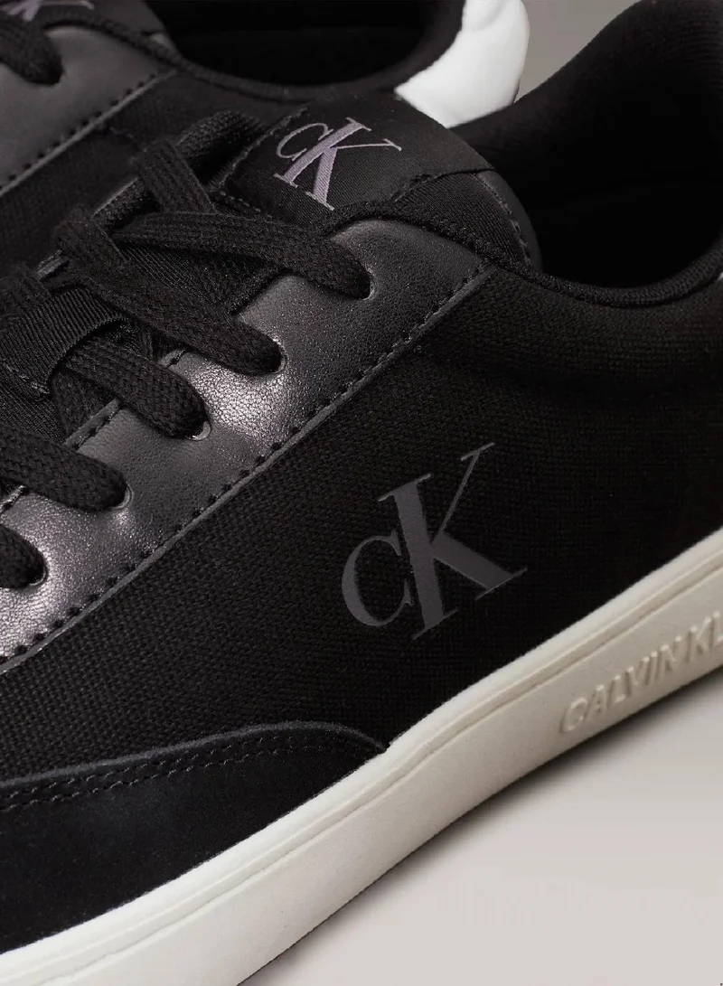 Calvin Klein Jeans Black/Bright White Canvas Trainers for Men | Best Price UAE