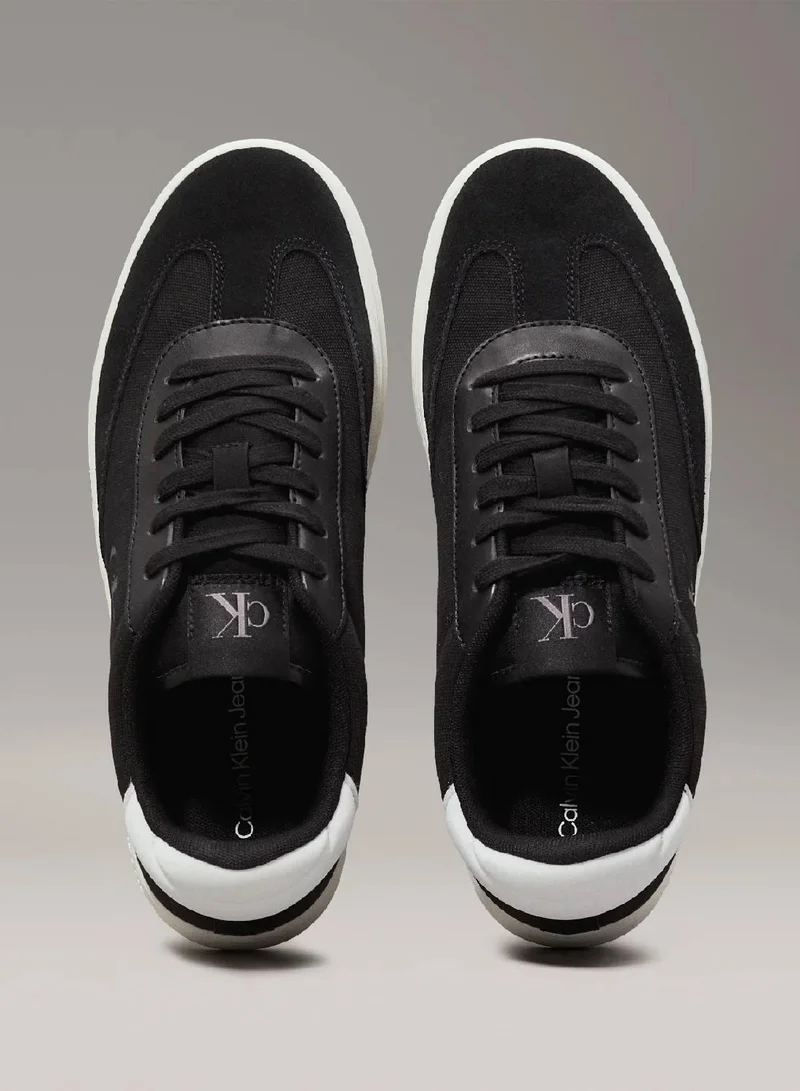 Calvin Klein Jeans Black/Bright White Canvas Trainers for Men | Best Price UAE
