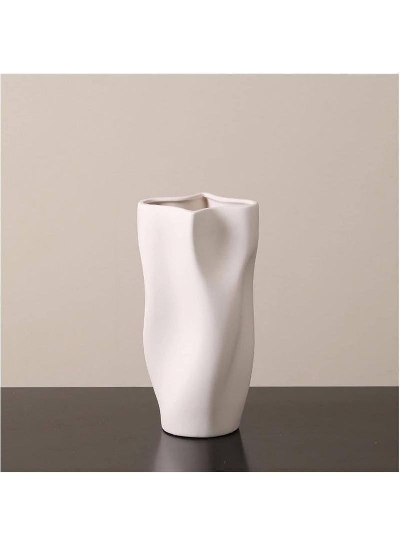 Razz Gallery The white wavy vase is a decorative piece that combines softness with artistic details, giving any space a sense of luxury and harmony. - Image 2