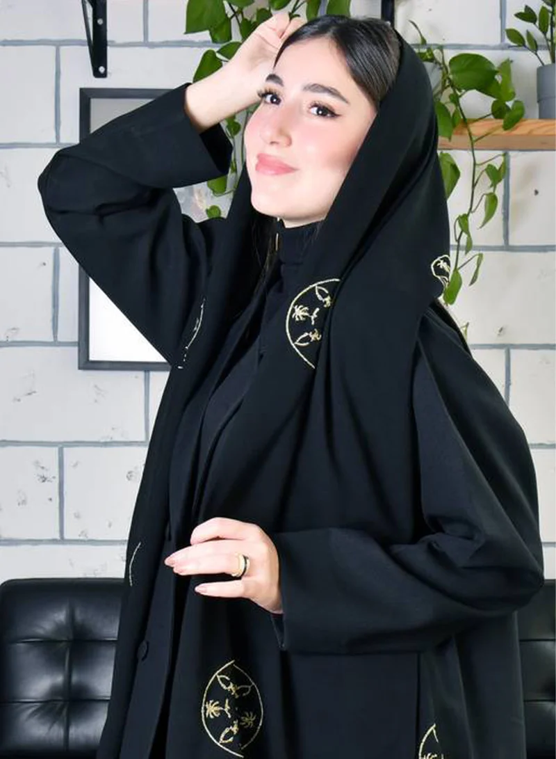 HAWRAA ABAYA Black silk scarf with gold embroidery with the founding logo