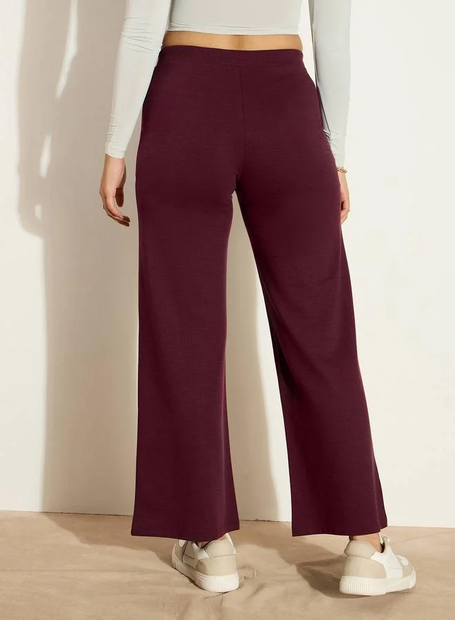 ساسافراس Mid Rise Wide Leg Terry Track Pants by Styli