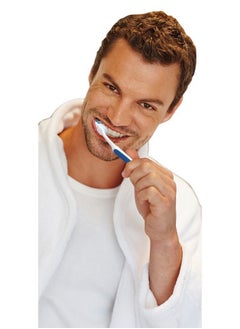 REACH Advanced Design Toothbrushes, Firm, 3 Count - Colors May Vary  - Image 4
