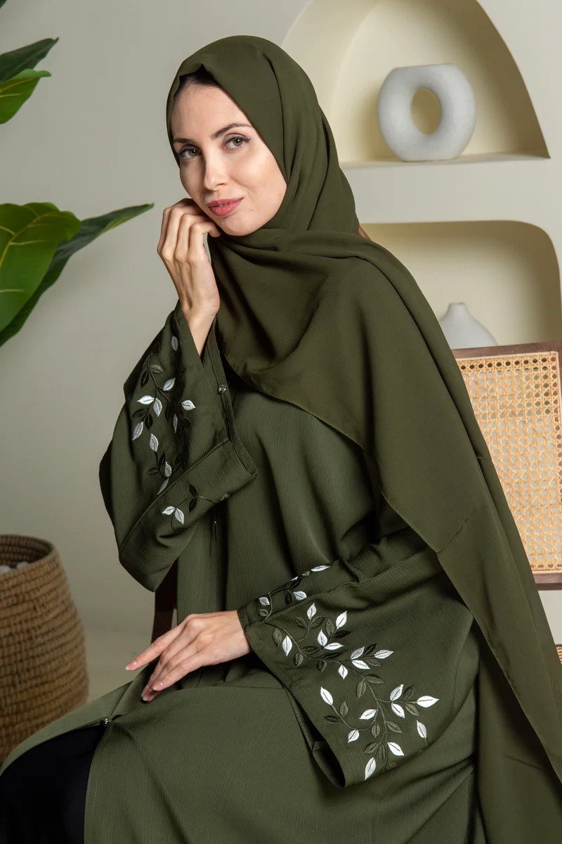NUKHBAA Green abaya with embroidery on sleeves